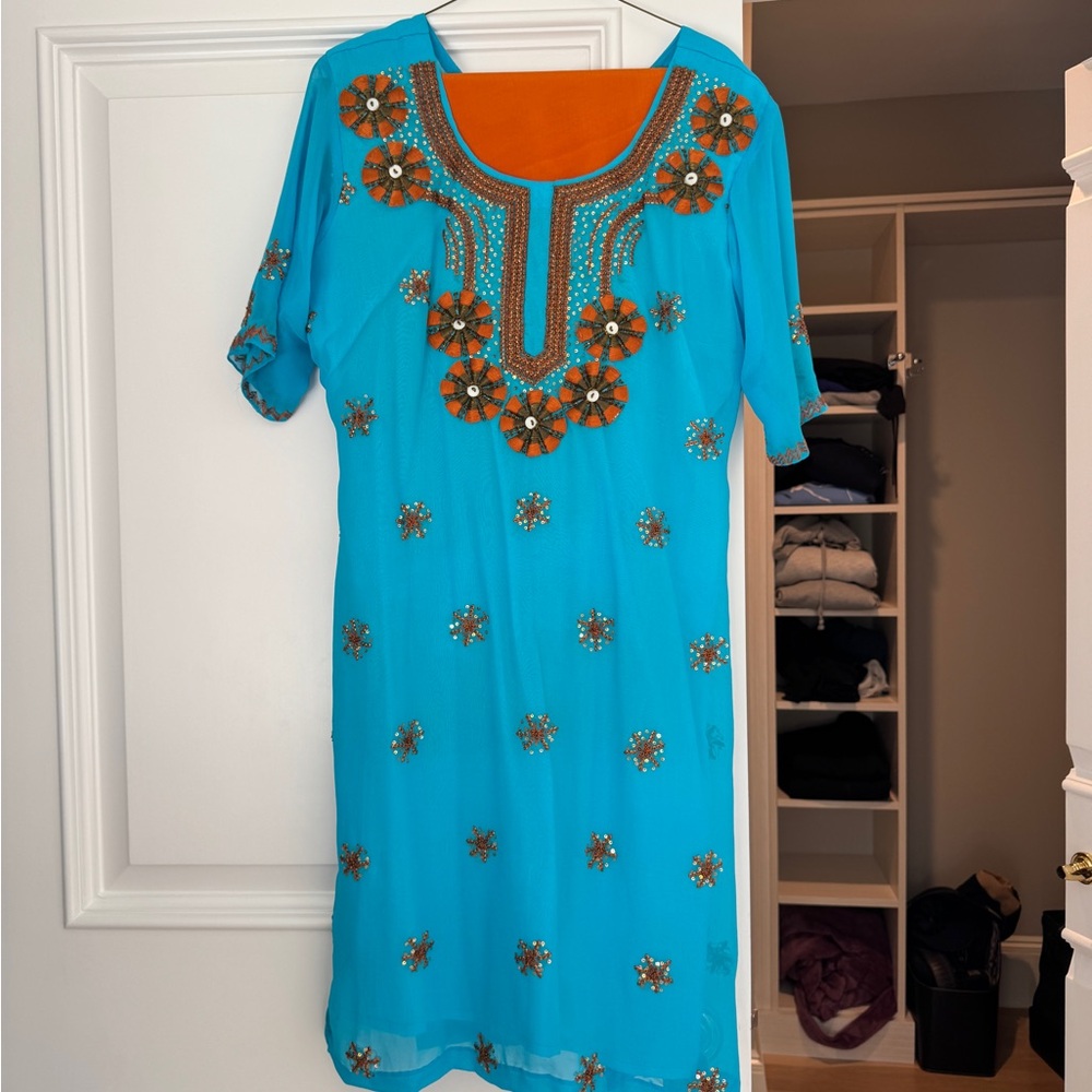 Vibrant Blue Dress with Orange Floral Accents